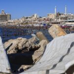 In Gaza, Palestinians flee scorching tents for a polluted sea