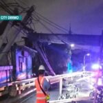 Two electrical poles collapse in Navotas injuring two and causing power outage