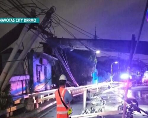 Two electrical poles collapse in Navotas injuring two and causing power outage