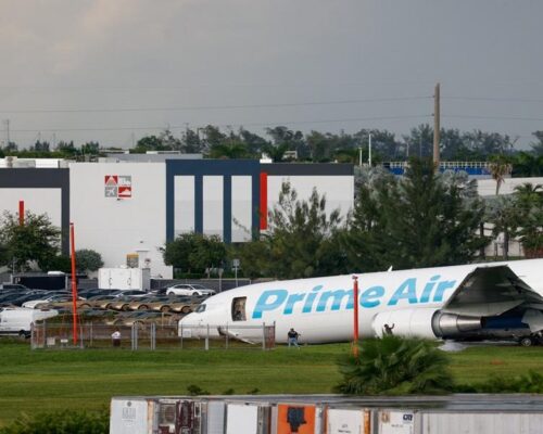 Amazon cargo plane overshoots Miami runway, hits vehicles, catches fire