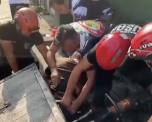 Broken-hearted or termite gang? Man trapped in the sewer rescued in Quezon City
